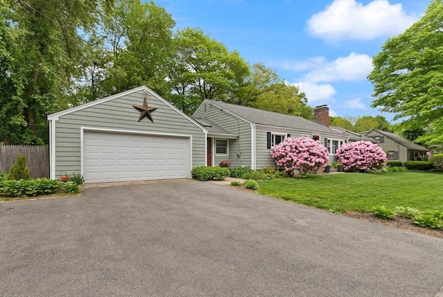 29 Day Ave, Hamilton, MA 01982 - ranch-style home with a chimney and a detached garage