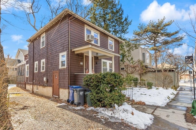 view of front of home featuring cooling unit