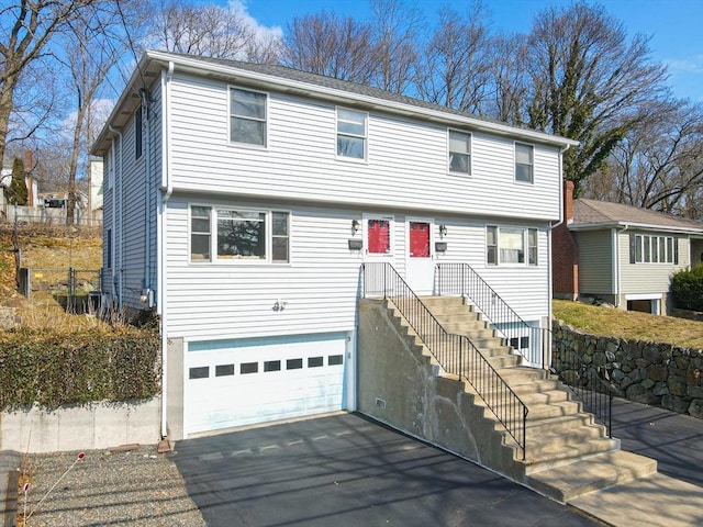75 Columbus Ave Unit 75, Waltham, MA 02451 - colonial home with a garage and driveway