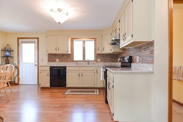 75 Columbus Ave Unit 75, Waltham, MA 02451 - kitchen with black dishwasher, stainless steel electric range oven, a sink, and plenty of natural light