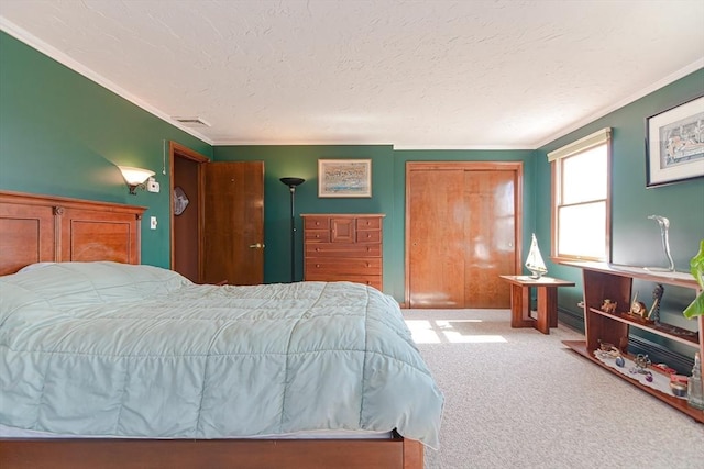 75 Columbus Ave Unit 75, Waltham, MA 02451 - bedroom featuring crown molding, carpet floors, and a textured ceiling
