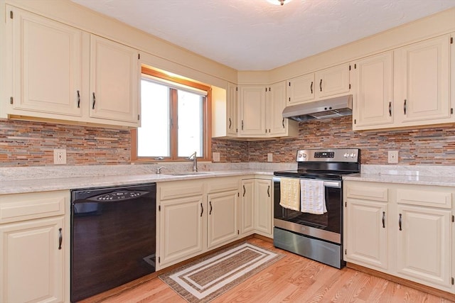 75 Columbus Ave Unit 75, Waltham, MA 02451 - kitchen featuring under cabinet range hood, stainless steel electric range, dishwasher, a sink, and light wood-style flooring