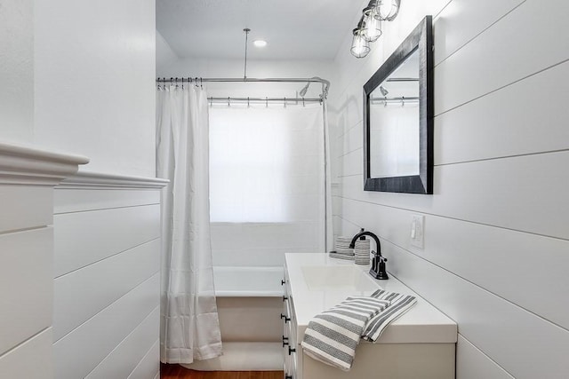 full bathroom with shower / tub combo with curtain and vanity