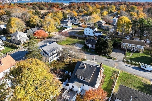 birds eye view of property with a residential view