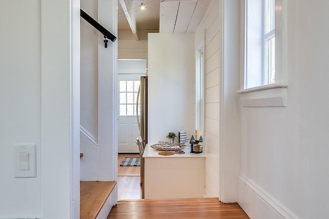 hall featuring wood finished floors