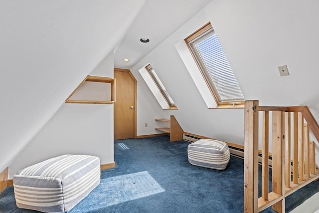 additional living space featuring baseboards, lofted ceiling with skylight, and carpet flooring