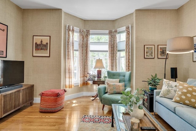 5 Mendell Way Unit 1, Boston, MA 02130 - living area with wood finished floors and wallpapered walls