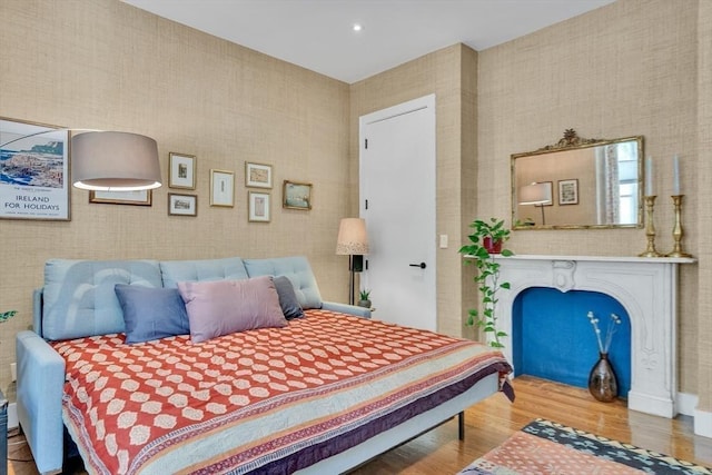 5 Mendell Way Unit 1, Boston, MA 02130 - bedroom with wood finished floors and a fireplace