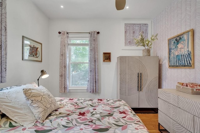 5 Mendell Way Unit 1, Boston, MA 02130 - bedroom with wallpapered walls, wood finished floors, and recessed lighting