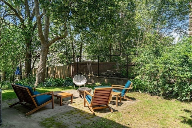 5 Mendell Way Unit 1, Boston, MA 02130 - view of yard featuring an outdoor fire pit and a patio