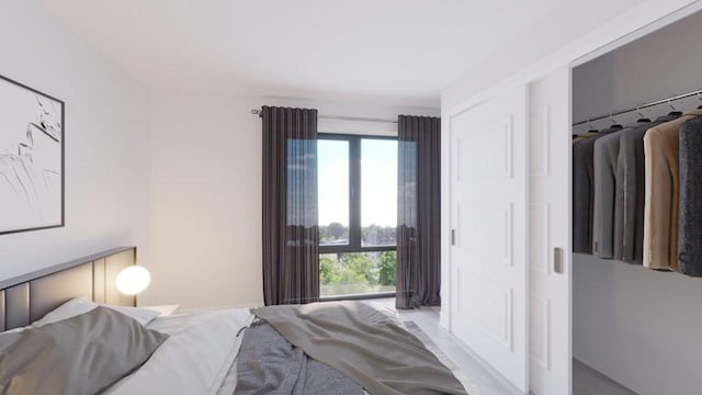 bedroom featuring a closet and multiple windows