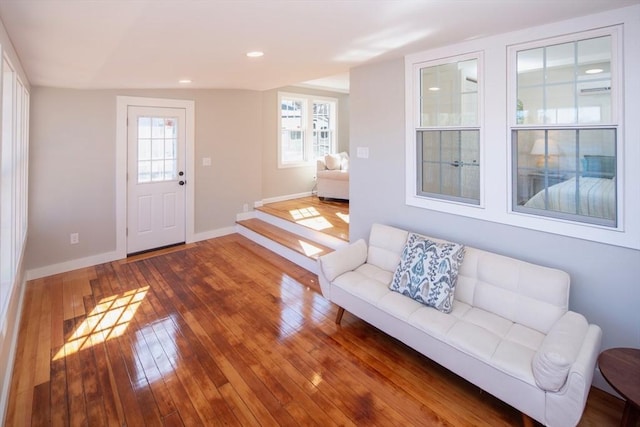 foyer with recessed lighting, baseboards, and hardwood / wood-style flooring