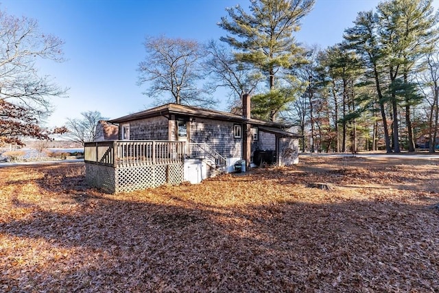 exterior space with a wooden deck