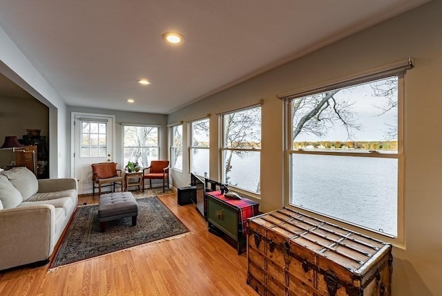24 Shore Rd, Southwick, MA 01077 - living area with light wood finished floors, recessed lighting, and a water view