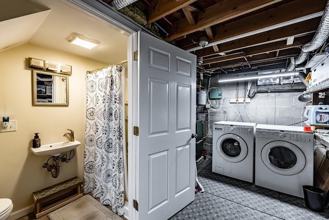 24 Shore Rd, Southwick, MA 01077 - laundry room featuring washing machine and clothes dryer and concrete block wall
