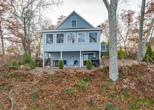 24 Shore Rd, Southwick, MA 01077 - back of house featuring stairway