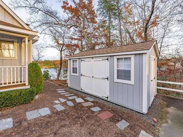 24 Shore Rd, Southwick, MA 01077 - view of shed with a water view and fence
