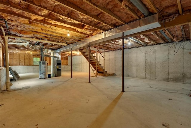 25 Liam Ln, Barnstable, MA 02632 - unfinished basement featuring water heater and stairway