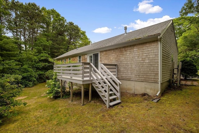 25 Liam Ln, Barnstable, MA 02632 - back of property featuring a deck, stairs, a yard, and a shingled roof