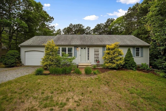 25 Liam Ln, Barnstable, MA 02632 - ranch-style house with driveway, an attached garage, and a front lawn