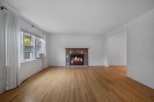 25 Liam Ln, Barnstable, MA 02632 - unfurnished living room featuring light wood-style flooring and a fireplace