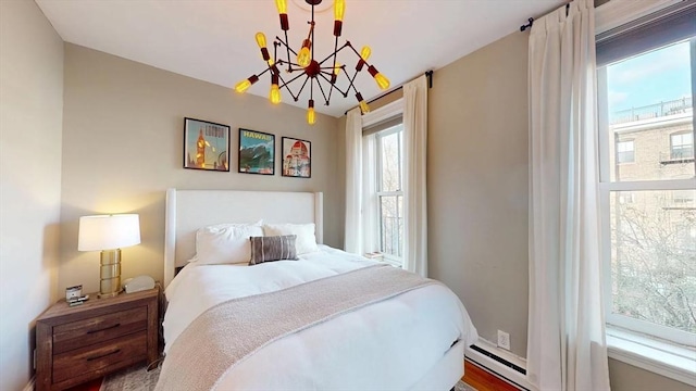 bedroom with an inviting chandelier