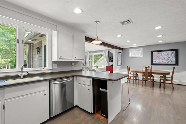 18 Arend Cir, Hanover, MA 02339 - kitchen featuring dishwasher, a sink, a peninsula, white cabinetry, and dark wood-style floors
