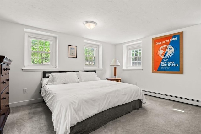 18 Arend Cir, Hanover, MA 02339 - carpeted bedroom with baseboard heating, multiple windows, and baseboards