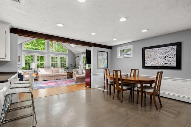 18 Arend Cir, Hanover, MA 02339 - dining room with wood finished floors, vaulted ceiling, a textured ceiling, recessed lighting, and wainscoting
