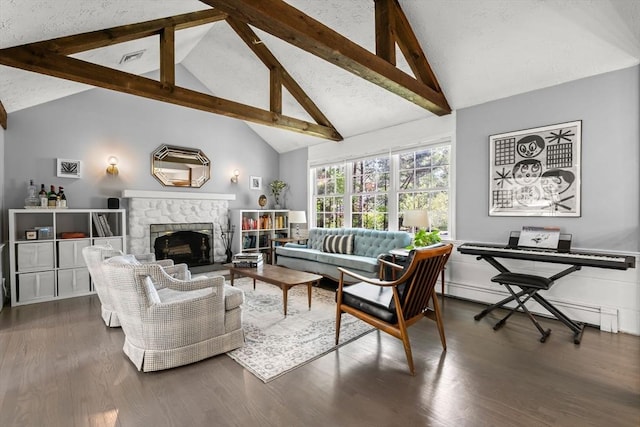 18 Arend Cir, Hanover, MA 02339 - living room featuring beam ceiling, a baseboard radiator, wood finished floors, a stone fireplace, and high vaulted ceiling
