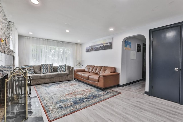 35 Linden Ter, Lynn, MA 01902 - living room with arched walkways, wood finished floors, and recessed lighting