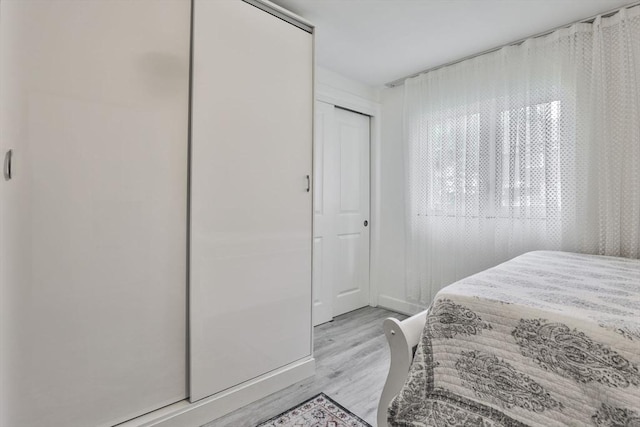 35 Linden Ter, Lynn, MA 01902 - bedroom featuring wood finished floors, baseboards, and a closet