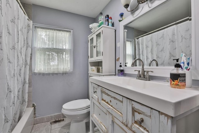 35 Linden Ter, Lynn, MA 01902 - bathroom with toilet, vanity, and shower / tub combo