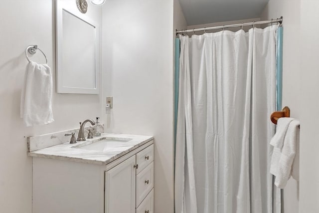 full bathroom featuring vanity and a shower with shower curtain