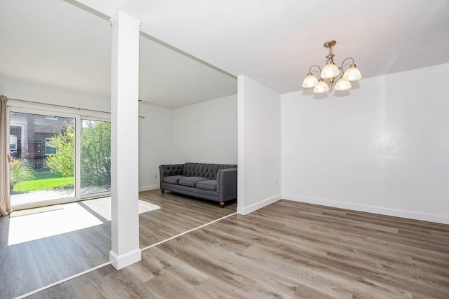 20 Patricia Dr Unit 20, Stoughton, MA 02072 - unfurnished room with wood finished floors, a chandelier, and baseboards