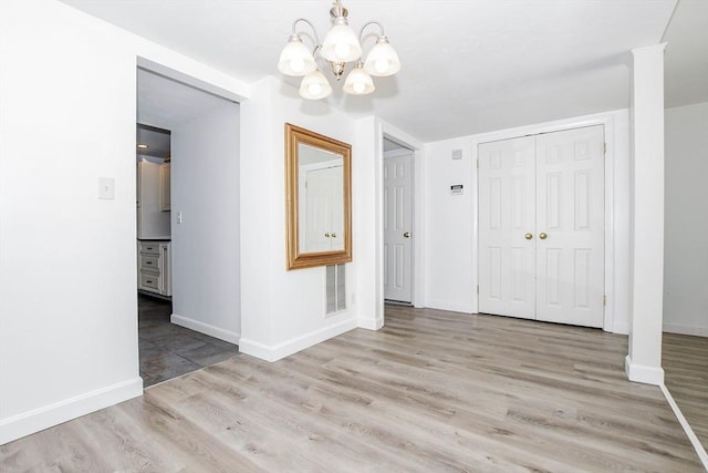 20 Patricia Dr Unit 20, Stoughton, MA 02072 - entryway featuring a chandelier, wood finished floors, and baseboards