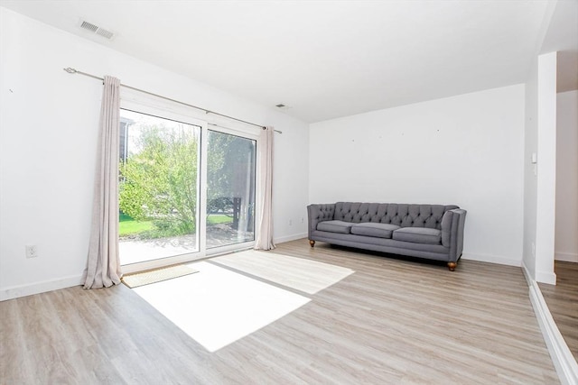 20 Patricia Dr Unit 20, Stoughton, MA 02072 - living area featuring wood finished floors and baseboards