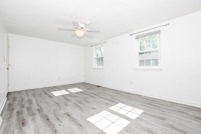 20 Patricia Dr Unit 20, Stoughton, MA 02072 - unfurnished room with ceiling fan, light wood-style floors, and baseboards