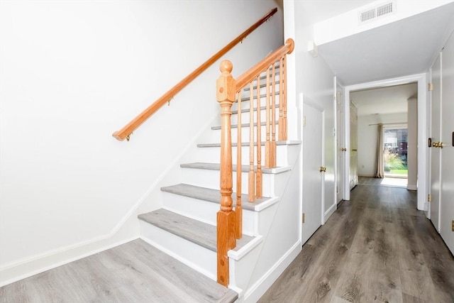 20 Patricia Dr Unit 20, Stoughton, MA 02072 - stairway featuring wood finished floors and baseboards