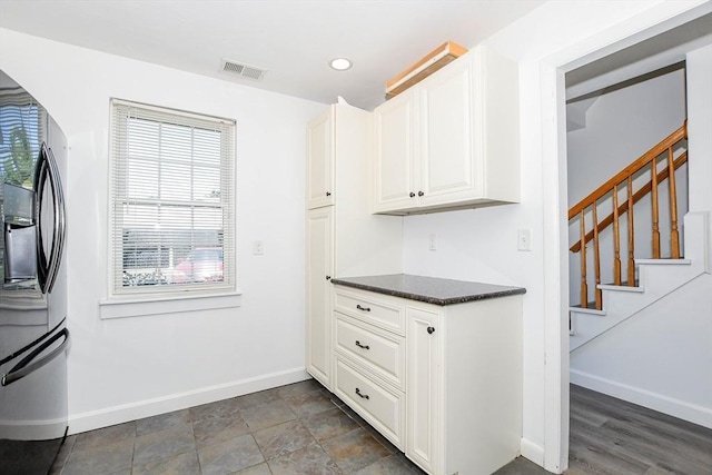 20 Patricia Dr Unit 20, Stoughton, MA 02072 - kitchen with baseboards, stainless steel fridge with ice dispenser, white cabinets, and recessed lighting