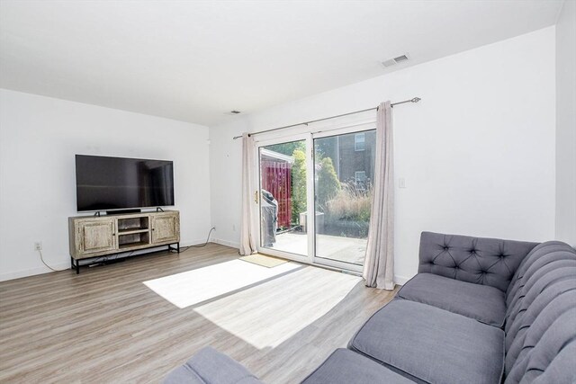 20 Patricia Dr Unit 20, Stoughton, MA 02072 - living area featuring light wood-type flooring and baseboards