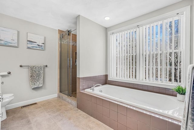 bathroom with a bath, visible vents, a shower stall, and toilet