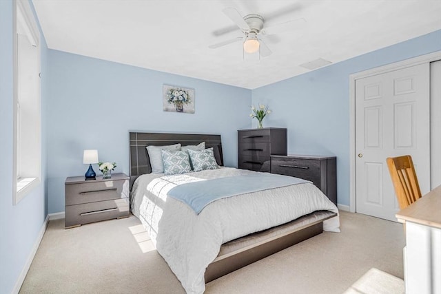 bedroom with carpet flooring, ceiling fan, and baseboards