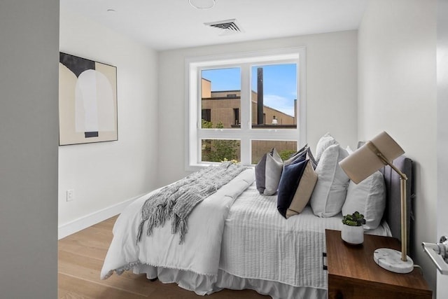 301 Border Unit 409, Boston, MA 02128 - bedroom with wood finished floors and baseboards