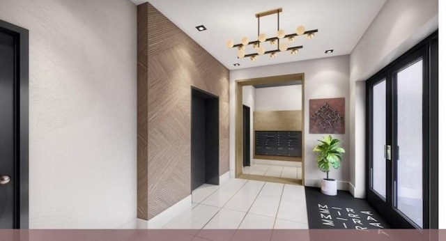 301 Border Unit 409, Boston, MA 02128 - tiled entrance foyer featuring mail area and baseboards