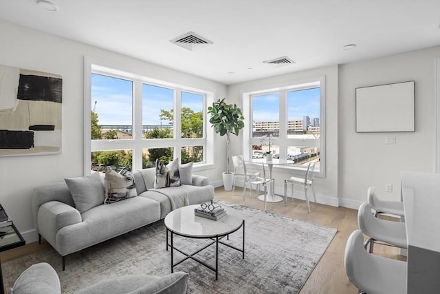 301 Border Unit 409, Boston, MA 02128 - living room featuring wood finished floors and baseboards