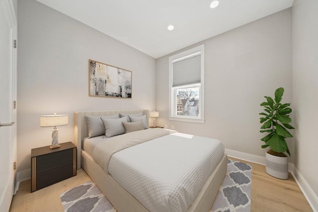 bedroom featuring recessed lighting, light wood-type flooring, and baseboards