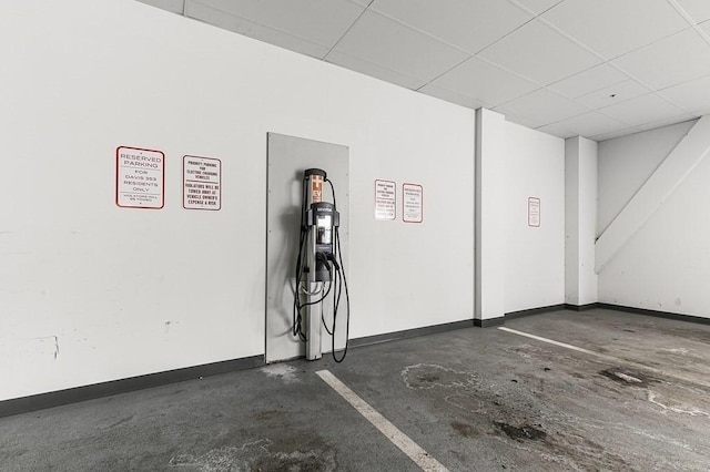 garage featuring baseboards