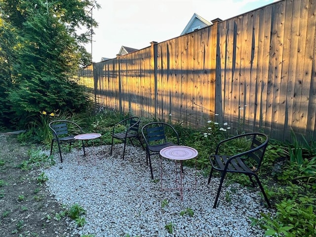 view of yard with a patio and fence