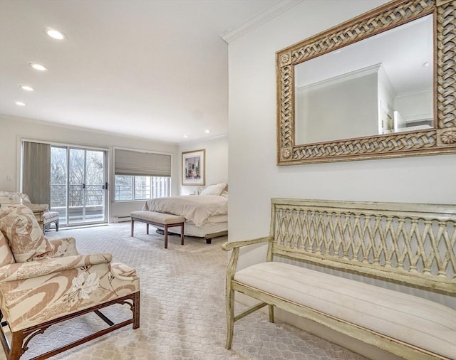 carpeted living area featuring ornamental molding and recessed lighting